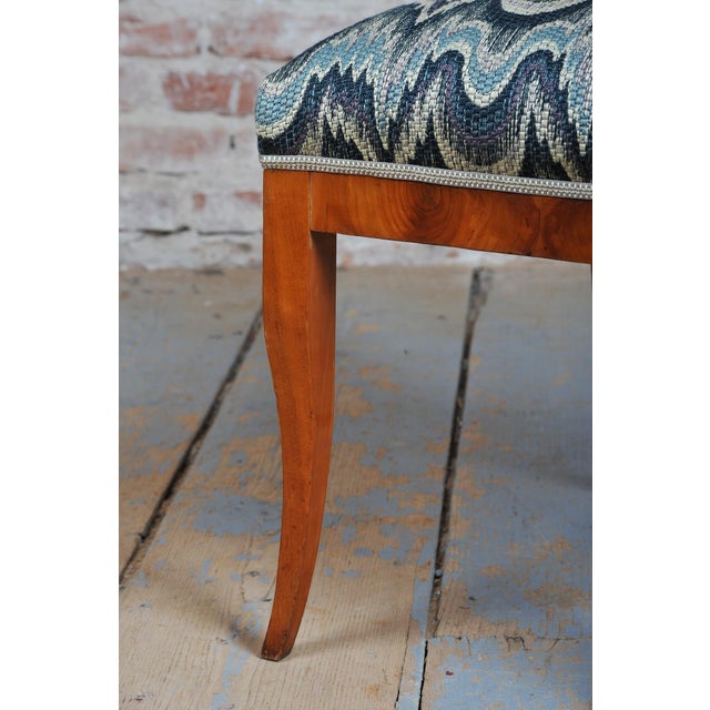 This set of four chairs is an exceptional example of Central European Biedermeier from the early 19th century, originating...