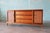 A 1960s dresser cabinet by Lane of Alta Vista Virginia. A part of the Rhythm series this cabinet features a walnut case...