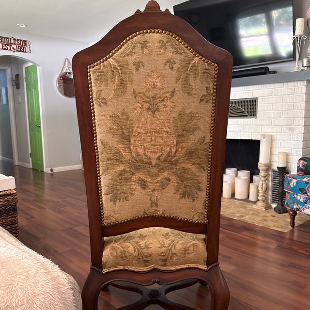 Louis XV Silhouette: Characterized by the elegantly curved, S-shaped cabriole legs terminating in small scroll feet....