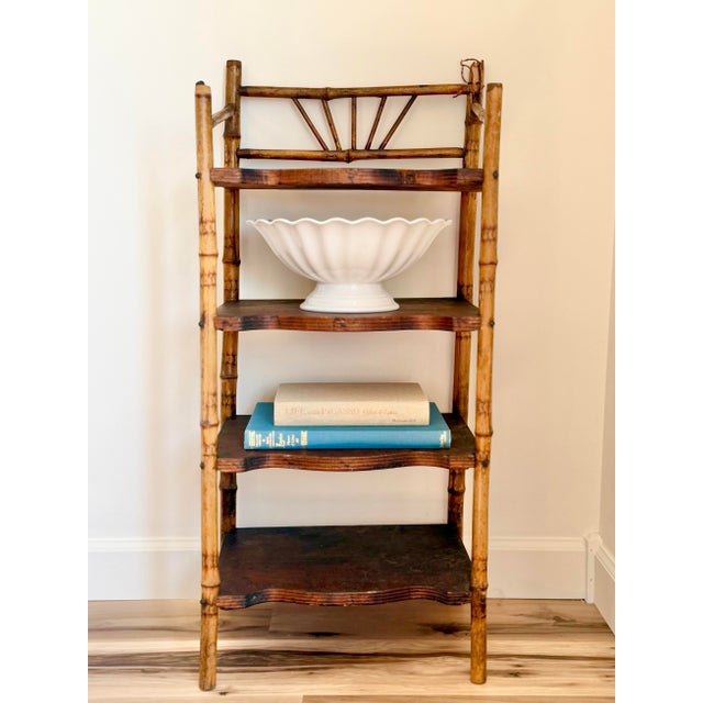 Antique English bamboo étagère with genuine tortoiseshell-effect finish, circa 1800s. Four graduated tiers with fan-crest...