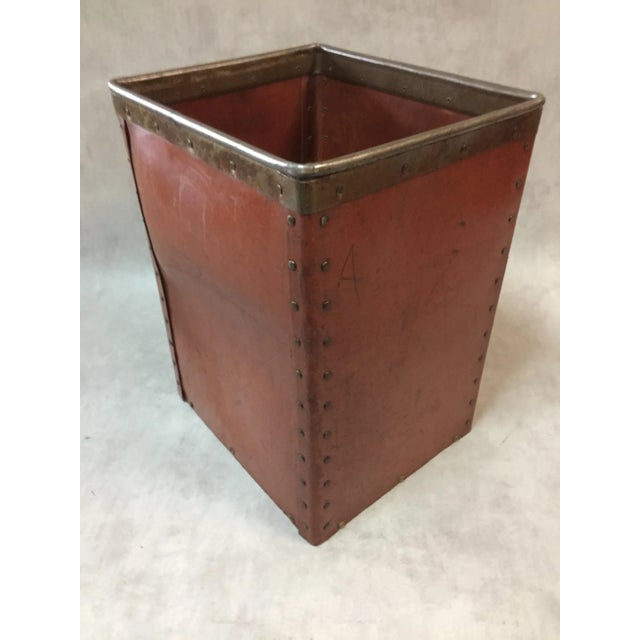 Cardboard trimmings of the brand Suroy, cardboard waxed, riveted and metal rimmed style Vuitton suitcases, 1920s....