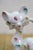 Mid Century Japan Porcelain Long Neck Cat Figurines Calico Splatter Pair 1950s For Sale - Image 9 of 11