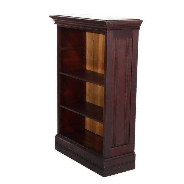 Antique Mahogany Petite Open Bookcase C1930 Measures - 41.5"H x 28"W x 11.75"D An antique mahogany open bookcase features...