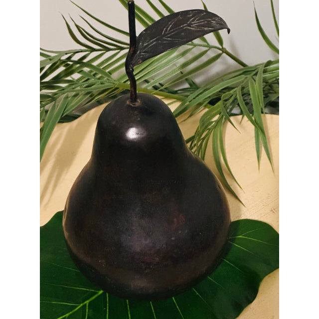 A extra large vintage pear made by Maitland - Smith a light metal a bronze finish. Great center piece.