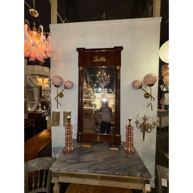 The 19th c. French Empire Mahogany Mirror is a stylish and elegant piece of home décor that exudes sophistication and...