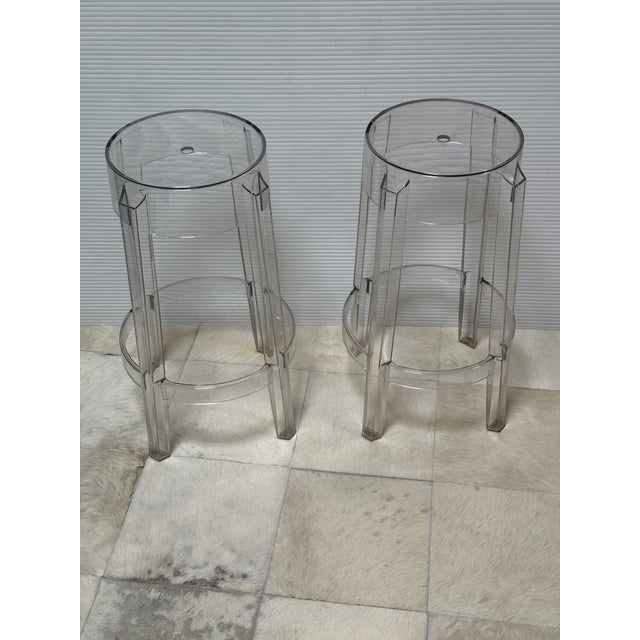 Design Plus Gallery presents a Pair of Charles Ghost Counter Stools by Philippe Starck for Kartell. These stools mirror...
