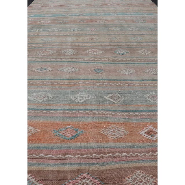 Mid 20th Century Mid 20th Century Vintage Turkish Gallery Kilim With Stripes and Tribal Motifs in Muted Tones For Sale - Image 4 of 13