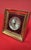 Swiss-made table alarm clock from the 1960s. This refined model is distinguished by its striking, textured, solid brass...