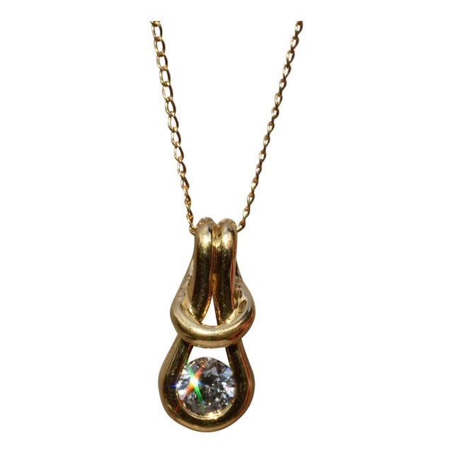 1990s The Alderly Street: Yellow Gold Love Knot Diamond Solitaire Necklace For Sale