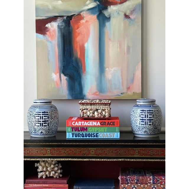 Found at the estate of a Washington Post writer whose work was about interior design and gardens, a pair of lidded blue...