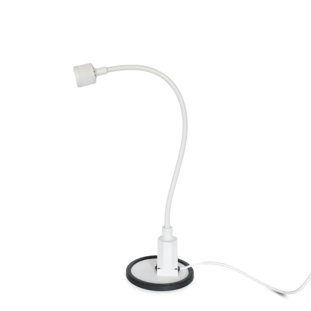 A vintage white Sunnex gooseneck desk lamp that is perfect for a minimalist, mid-century modern, or postmodern 1980s...