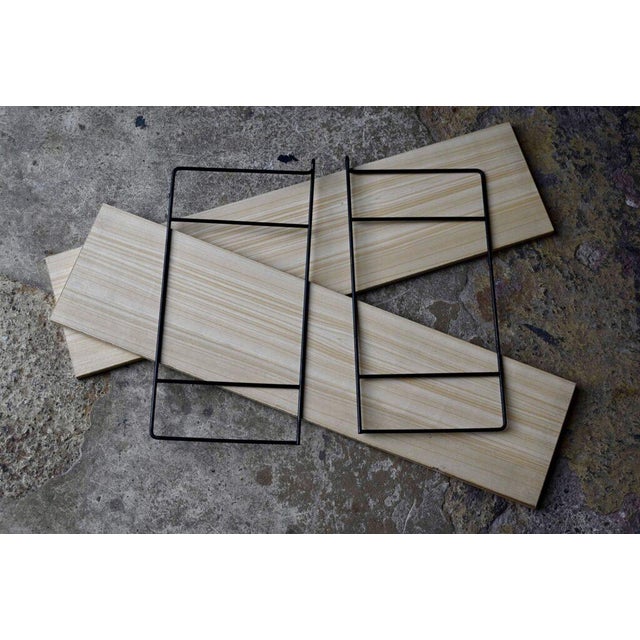 with their minimalist yet incredibly effective design, these String shelves are vintage design classics. This particular...