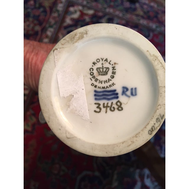 Such a sweet figurine of a little boy with his teddy bear. It is made by Royal Copenhagen, Denmark, No. 3468. The little...