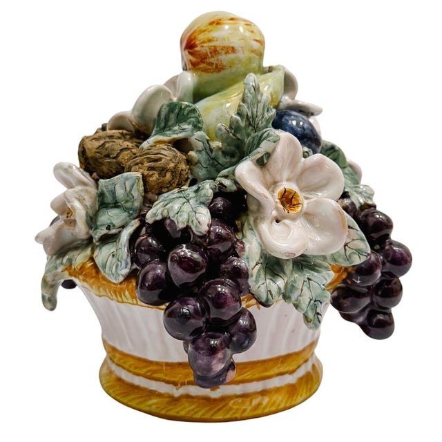 A classic example of French Barbotine pottery, this small scale centerpiece features a rustic provincial harvest of lush,...