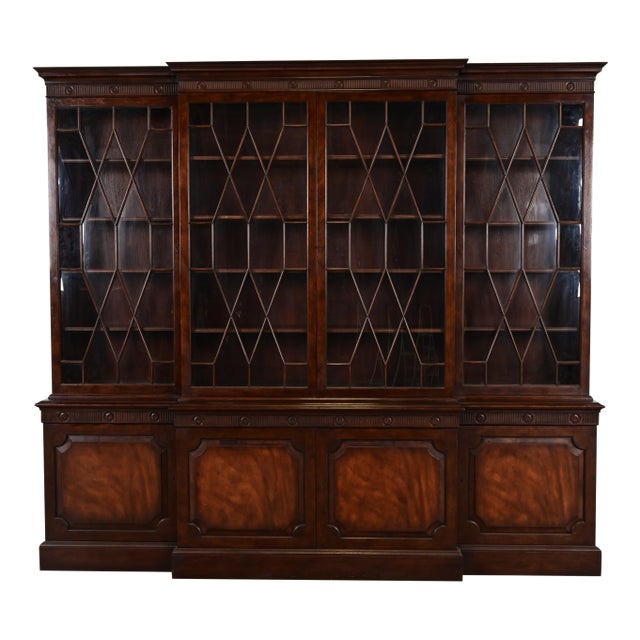 Baker Furniture Georgian Monumental Carved Flame Mahogany Breakfront Bookcase Cabinet, Circa 1960s For Sale