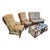 Elegant vintage rattan living room suite featuring dramatic fan-back silhouettes, sculptural bent-pole construction, and...