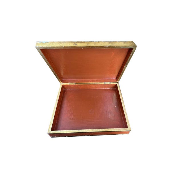 The box is hinged and perfect for storing jewelry, keepsakes, or other petite treasures. Features an elegant Florentine...