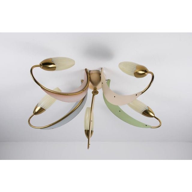 Mid-century brass and glass 5-arm sputnik chandelier, 1960s. This decorative ceiling light has a lively asymmetrical...