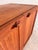 This teak chest of drawers is an absolutely exquisite design by the renowned designer H. W. Klein and a prime example of...