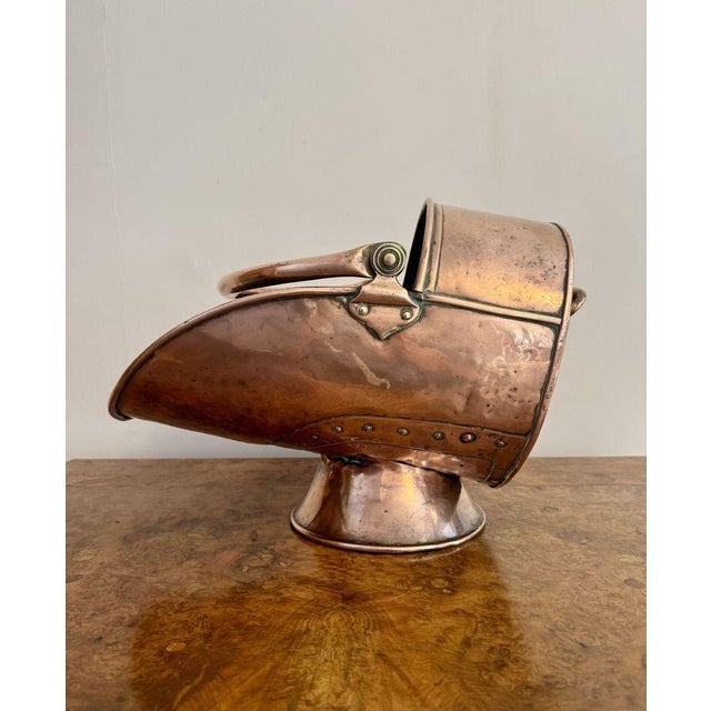 Antique George III Copper Coal Scuttle having a quality copper coal scuttle with a swing handle to the top and a handle to...