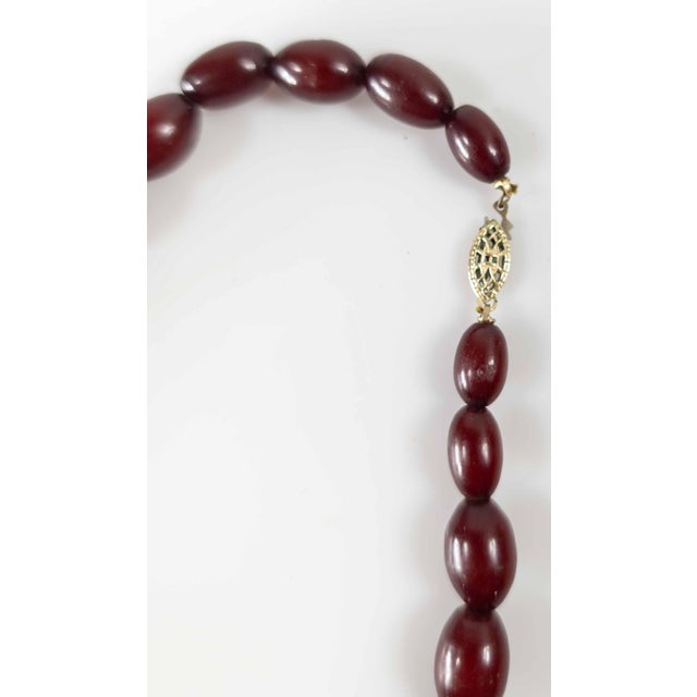 20th Century Art Deco Cherry Amber Bakelite Graduated Bead Necklace For Sale - Image 11 of 11