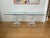 A striking pair of modern stacked Lucite spiral side tables in the style of Karl Springer, characteristic of Postmodern or...