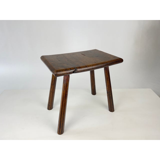 Antique 19th century stool / side table. Made of solid English oak, primitive vernacular rustic design. Oak top on spayed...