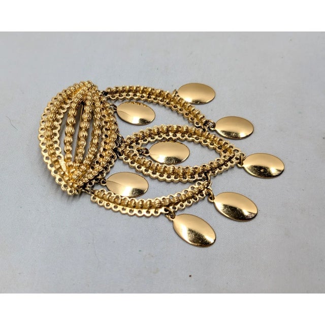 1970s Vintage Signed Monet Book Piece Goldtone "Sari" Dangle Brooch, 1971 For Sale - Image 5 of 7