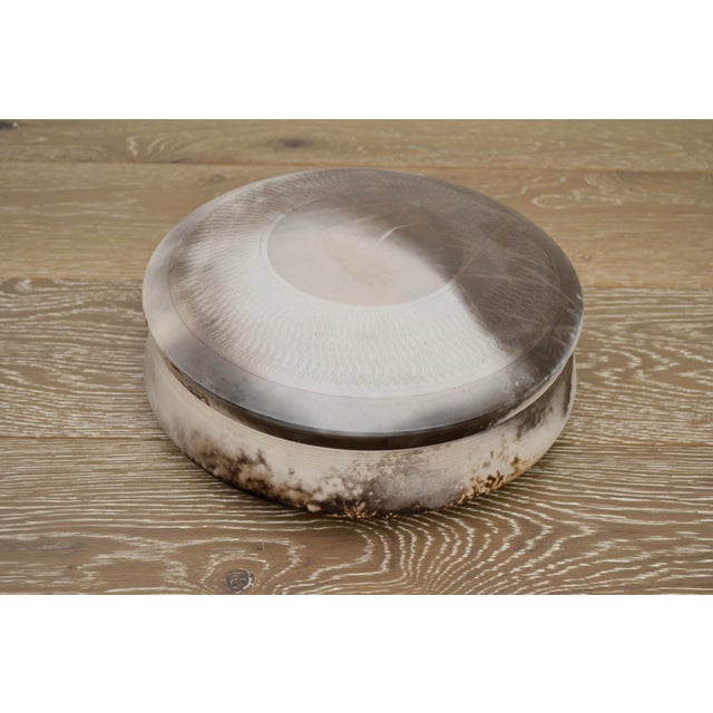 Mid century covered ceramic bowl. Finely crafted with detailed impressions and fired raku coloring. Unmarked. 4" x 11"