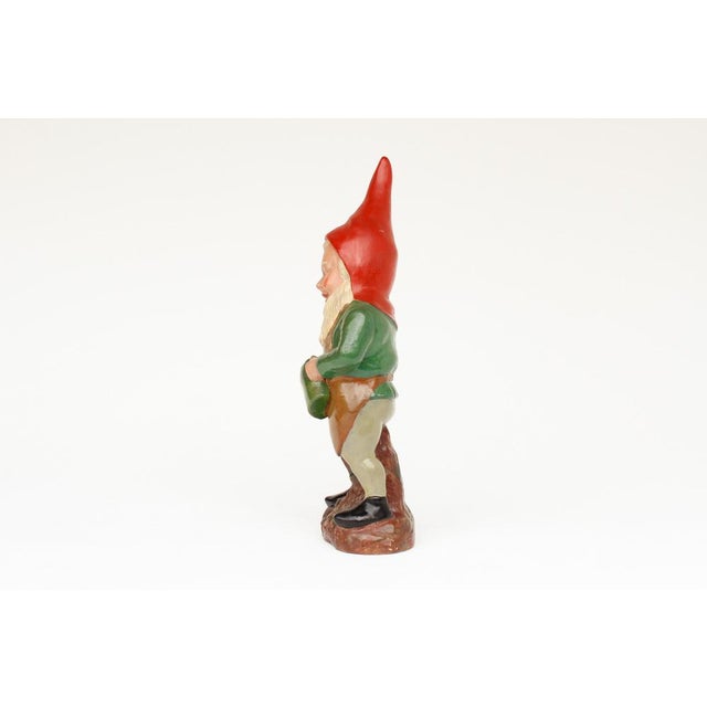 Beautiful terracotta garden gnome with watering can, made in East Germany in the 1950s. Manufacturer: VEB Design: Griebel...