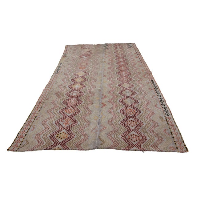Embroidered handwoven vintage kilim rug from Adana region of Turkey. Approximately 50-60 years old. In very good condition.