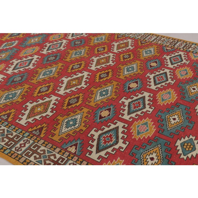 Hand-knotted in wool and believed to originate from Turkey circa 1970-1980, this 9x12 vintage Turkish Oushak rug is one of...