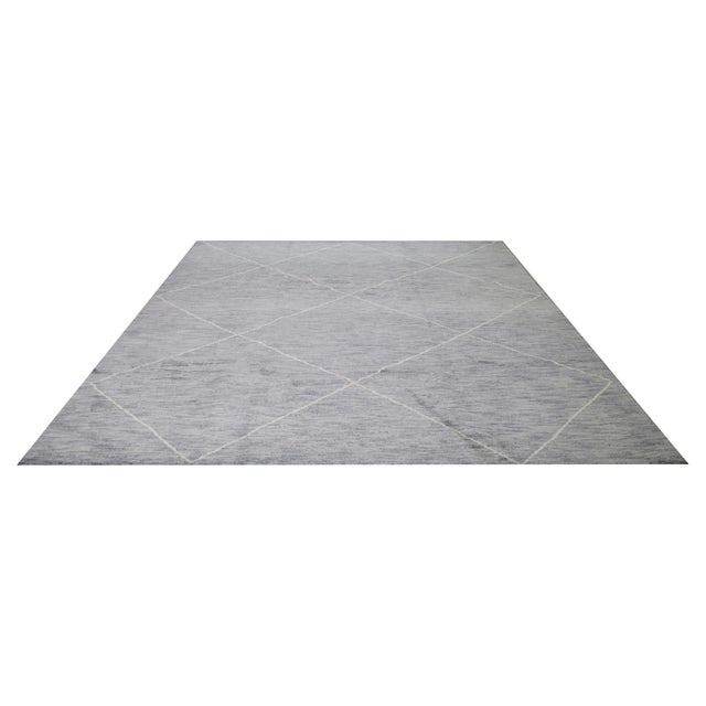 Moroccan Beni Ourain hand knotted rug with natural colors, contemporary style and soft texture.