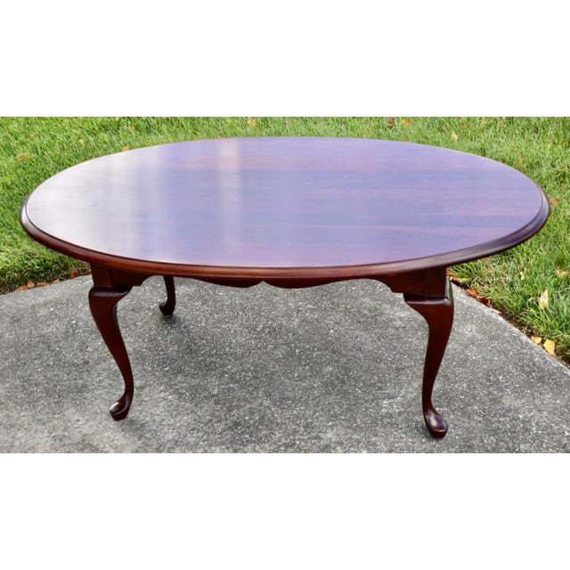 Vintage (1970's) Coffee Table has a Queen Anne Style is Oval in Shape with Cabriole Legs. The Maker is Pennsylvania House...