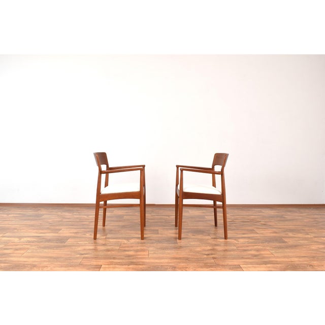 This set of two armchairs was designed in the 1960s by Henning Kjærnulf for Korup Stolefabrik (K.S. Mobelfabrik). The...