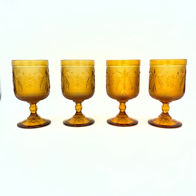 This beautiful amber set includes 4 goblets, 4 footed sherbets, 4 saucers, 4 bowls, 4 salad plates, 4 snack plates, and 4...
