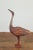 A vintage Indonesian hand carved heron sculpture from the mid-20th century, with polychrome finish. Hand carved in...