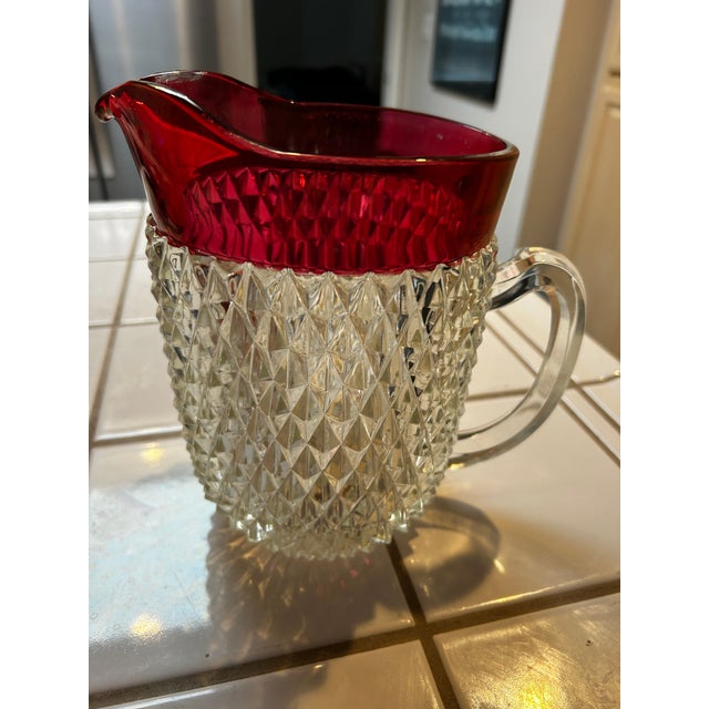 Set of Seven. Vintage Indiana Glass Company Cranberry Pitcher with Six matching Glasses. Beautiful set, a must for any...