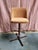 This pair of peach colored counter stools packs a punch of personality. Simple and comfortable, they were manufactured in...