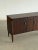 W48 D18 H28 Fully refinished to highlight the rich walnut wood grain. Features the original hardware, sculptural tapered...
