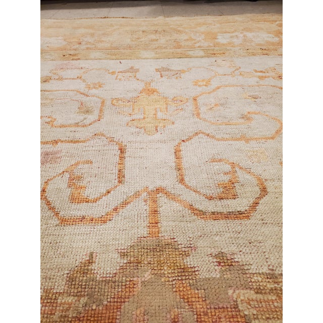 Oushak rugs, also known as Ushak rugs, are woven in Western Turkey and have distinct designs, such as angular large-scale...