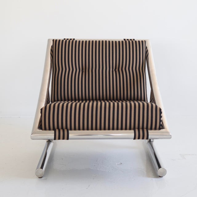 c. 1970s, fully restored in Maharam “Toostripe” - there is wear to the frame including scuffs, scratches, minor losses to...