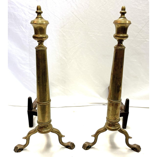 Stately pair of antique Bradley & Hubbard andirons. These andirons are from the turn of the century and designed in the...