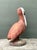 This vintage painted cement pelican sculpture brings a bold coastal note to a garden, patio, poolside setting, or sunroom....