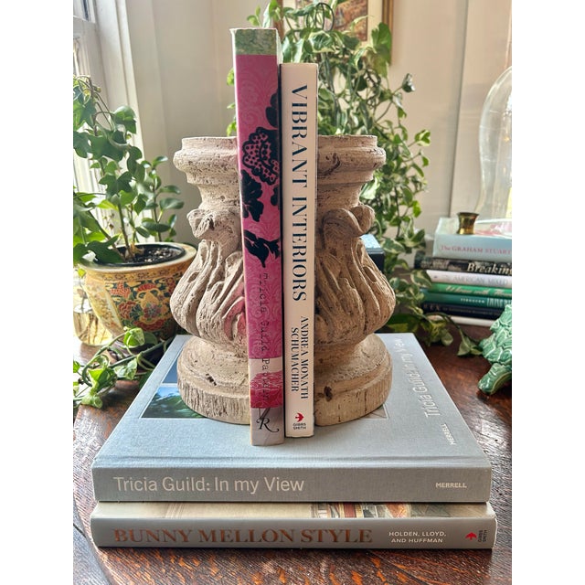 Unless you pick them up, these bookends are hard to distinguish from cast stone. They are Corinthian style, and resemble...