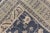 This vintage Turkish Oushak rug has been hand-knotted in wool and features a large central medallion design rendered in...