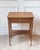 A finely crafted Louis XVI–style writing table by André Mailfert, produced in France during the mid-twentieth century....