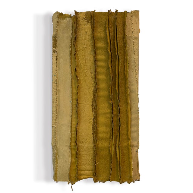 Surplus canvas and fabrics are sewn together and stretched over reused wood stretcher bars and then embellished with...