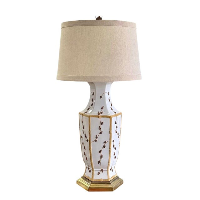 Classic and beautiful, these large octagonal table lamps are hand-decorated in a textural bamboo and vine motif in shades...