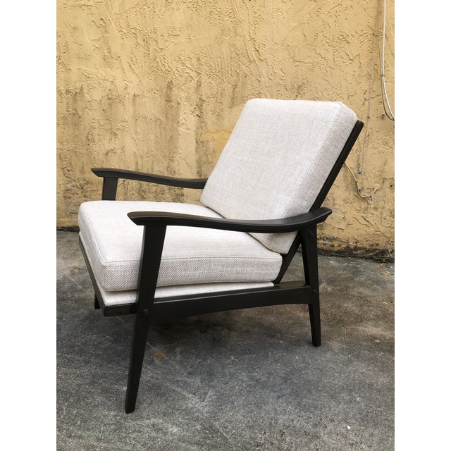 Beautiful Mid Century Danish lounge chair in great condition. Has been restored and reupholstered. The last picture shows...
